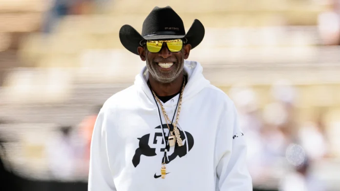 Deion Sanders celebrates receiving prosthetic toes four years after blood clots led to two toe amputations.